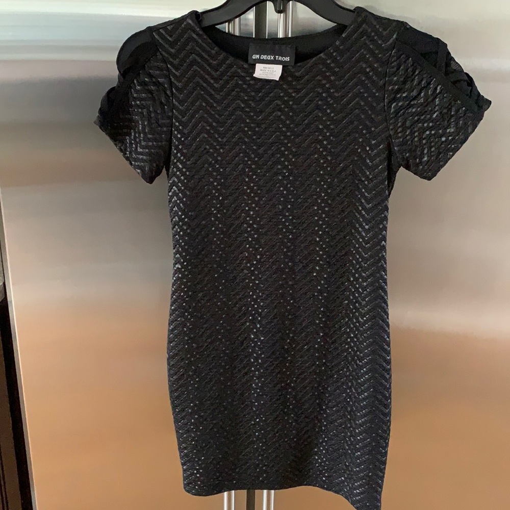 Gently worn Un Deux Trois girls size 14 polyester spandex black dress